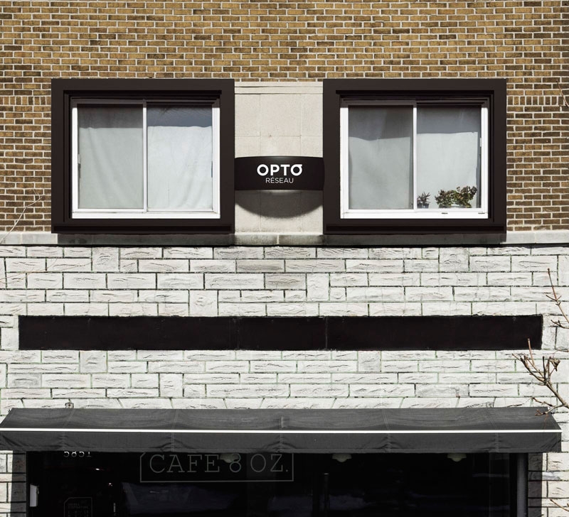 Edificios con gafas para anunciar una óptica