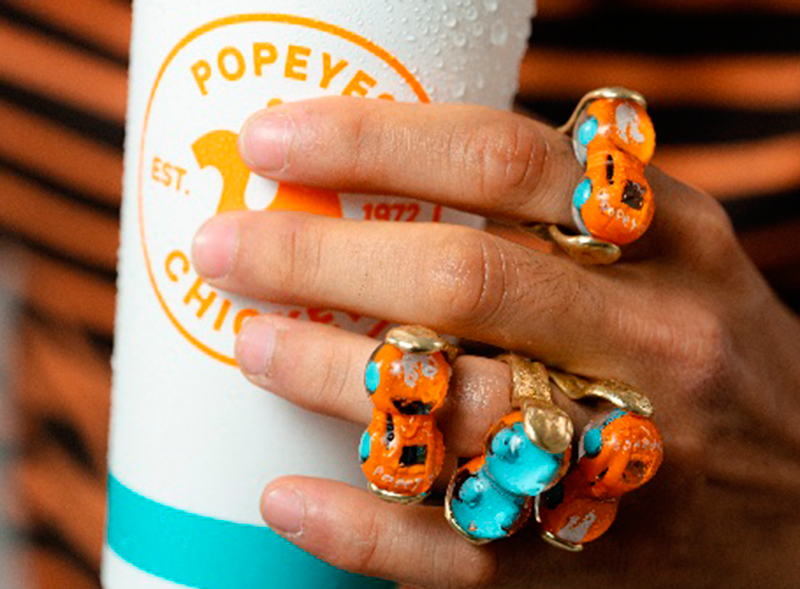 Popeyes By se estrena con una colección de anillos